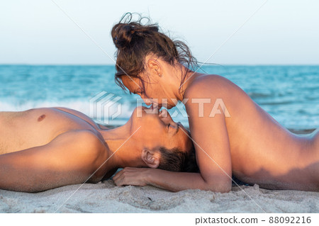 dominic schmid add naked woman kissing woman photo