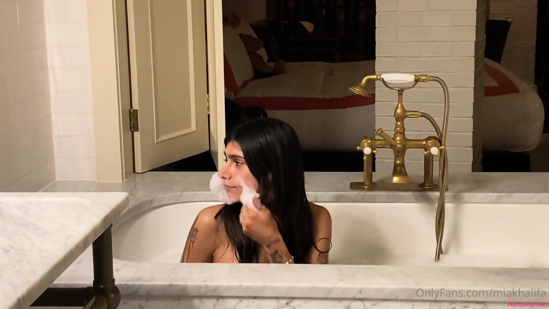 aaron grimes add mia khalifa bath tub image