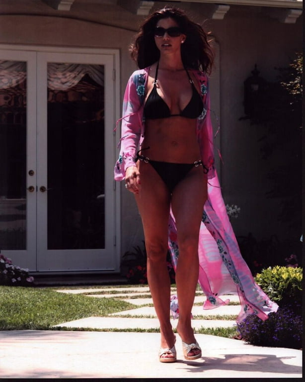 andrea hammers add charisma carpenter in bikini photo